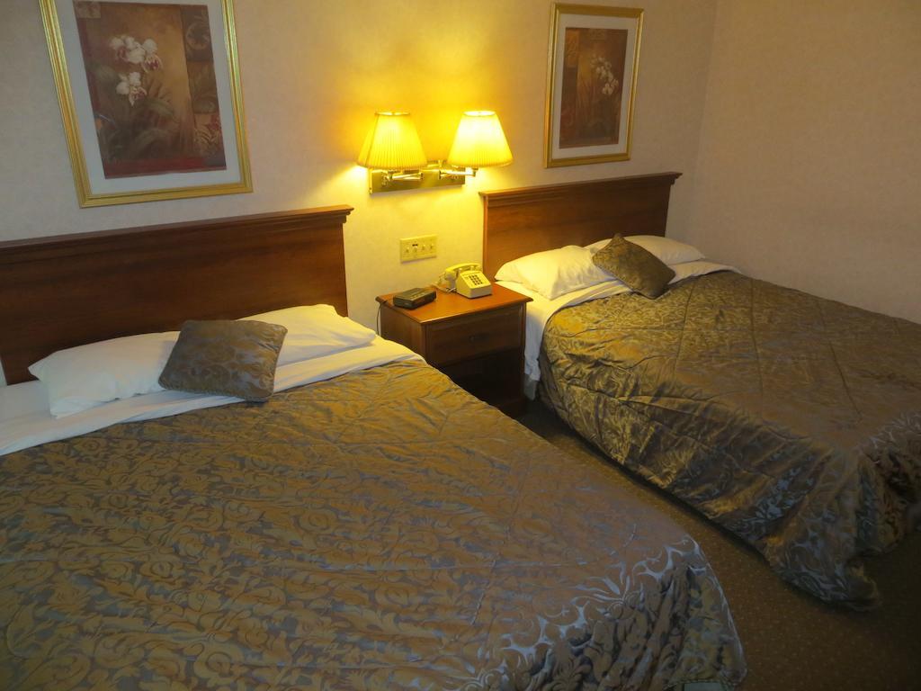 Ripon Welcome Inn And Suites Habitación foto